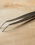 Close up of tweezer tips